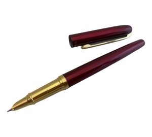 Sophisticated slim fountain pen with red and golden detailing